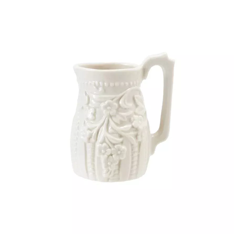 Tiny Antique Reproduction Embossed Creamer